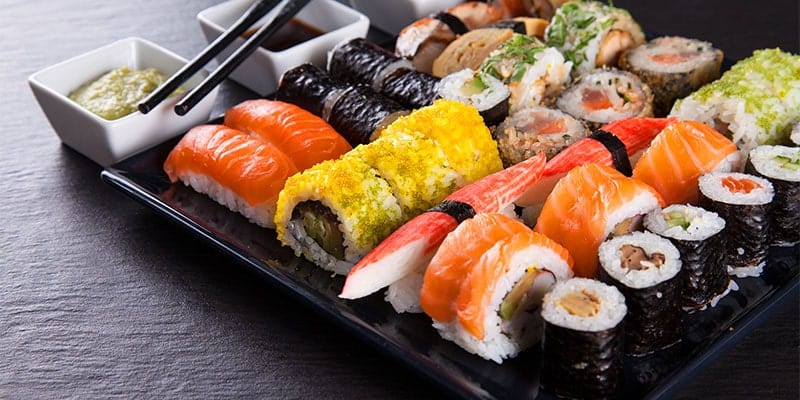 Japanese seafood sushi set on black background