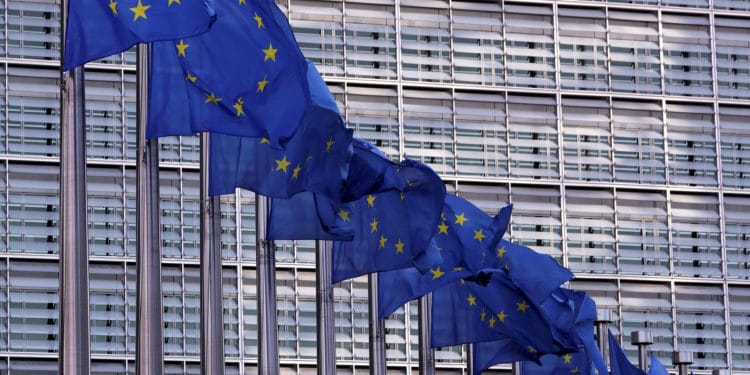 FILE PHOTO: European Union flags fly outside the European Commission headquarters in Brussels, Belgium, February 19, 2020. Picture taken February 19, 2020 REUTERS/Yves Herman/File Photo