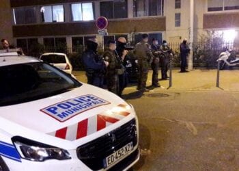 Police secures a street after a Greek Orthodox priest was shot and injured at a church in the centre of Lyon, France October 31, 2020. REUTERS/Cecile Mantovani