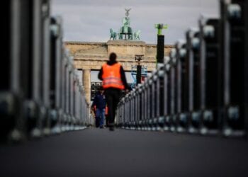 Stage cases are placed in front of the Brandenburg Gate during a protest in support of the event sector affected by the coronavirus disease (COVID-19), in Berlin, Germany, October 28, 2020. REUTERS/Hannibal Hanschke