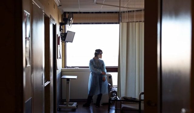 A Walgreens Pharmacist prepares the Pfizer-BioNTech coronavirus disease (COVID-19) vaccine at Hamilton Park Nursing and Rehabilitation, a nursing home facility, in Brooklyn, New York, U.S., January 4, 2021. REUTERS/Yuki Iwamura