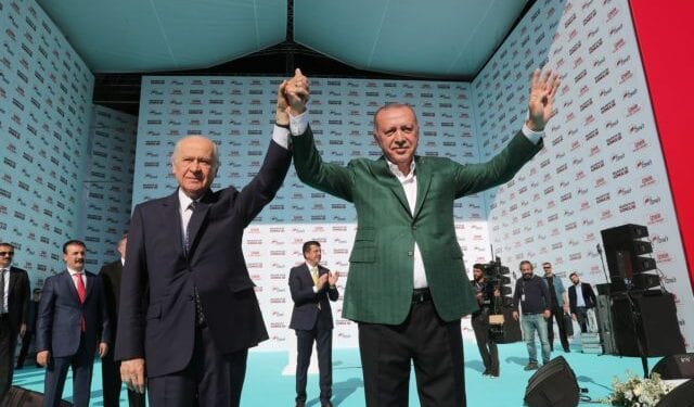 epa07445044 A handout photo made available by the Turkish President Press office shows Turkish President Recep Tayyip Erdogan (R) and leader of Nationalist Movement Party (MHP) Devlet Bahceli (L) as they greet their supporters during his Justice and Development Party (AK Party) and Nationalist Movement Party (MHP) local election campaign rally in Izmir, Turkey, 17 March 2019. Local elections in Turkey are scheduled for 31 March 2019. EPA/TURKISH PRESIDENT PRESS OFFICE HANDOUT HANDOUT EDITORIAL USE ONLY/NO SALES