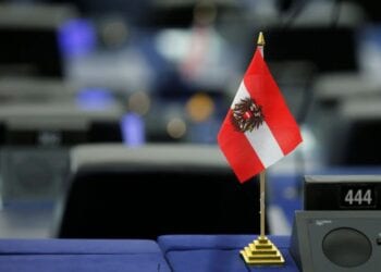 An Austrian flag is seen on the desk of a Member of the European Parliament during a debate at the European Parliament in Strasbourg, France, July 3, 2018. REUTERS/Vincent Kessler