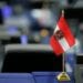 An Austrian flag is seen on the desk of a Member of the European Parliament during a debate at the European Parliament in Strasbourg, France, July 3, 2018. REUTERS/Vincent Kessler
