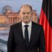 epa09781305 German Chancellor Olaf Scholz poses for pictures after he recorded a televised address to the nation following the Russian military invasion of Ukraine in Berlin, Germany, 24 February 2022. Russia began a large-scale attack on Ukraine, with explosions reported in multiple cities and far outside the restive eastern regions held by Russian-backed rebels.  EPA/Hannibal Hanschke / POOL